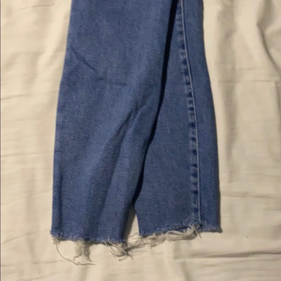 Washed up jeans, ripped at the bottom. - Picture 5 of 5